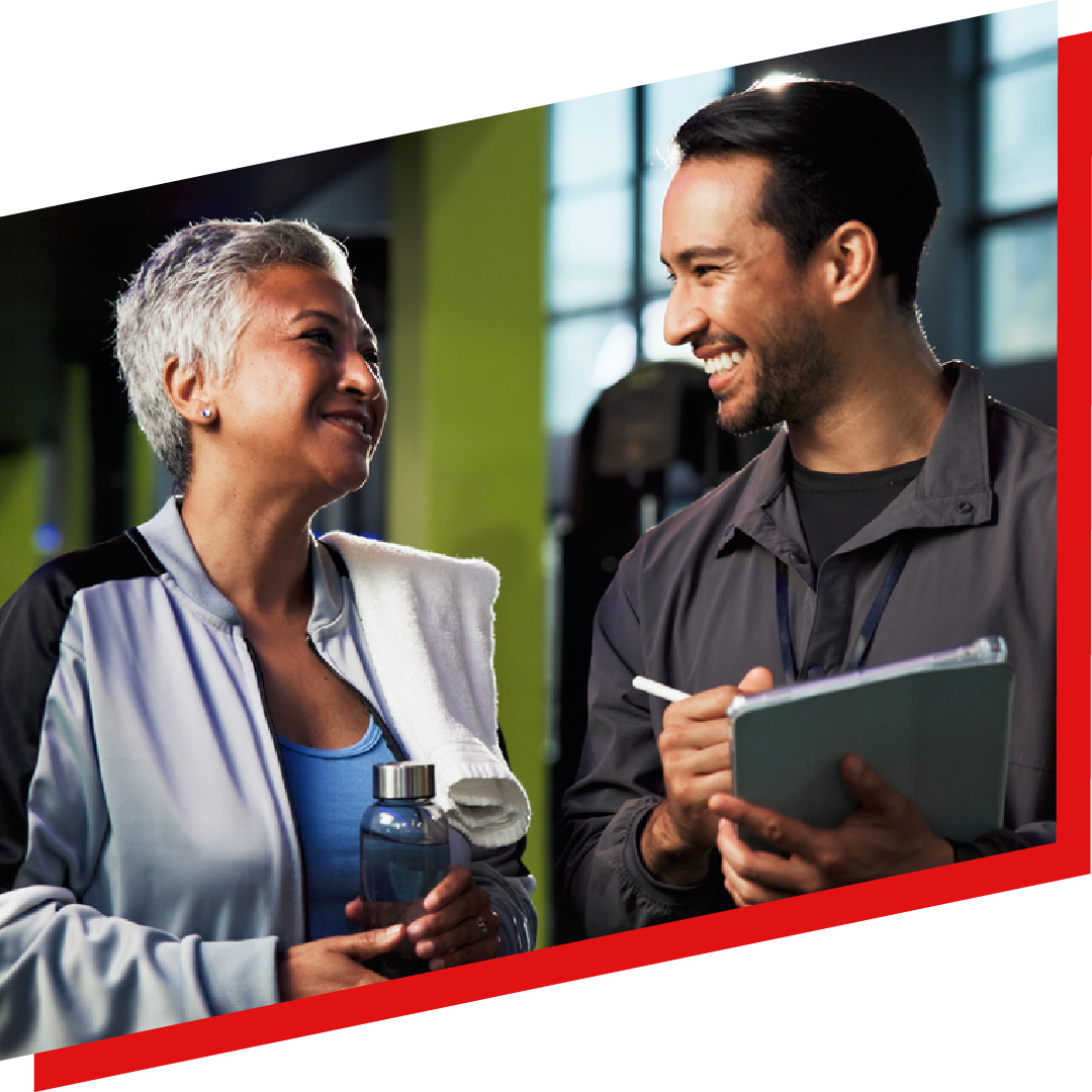 coach-smiling-with-official